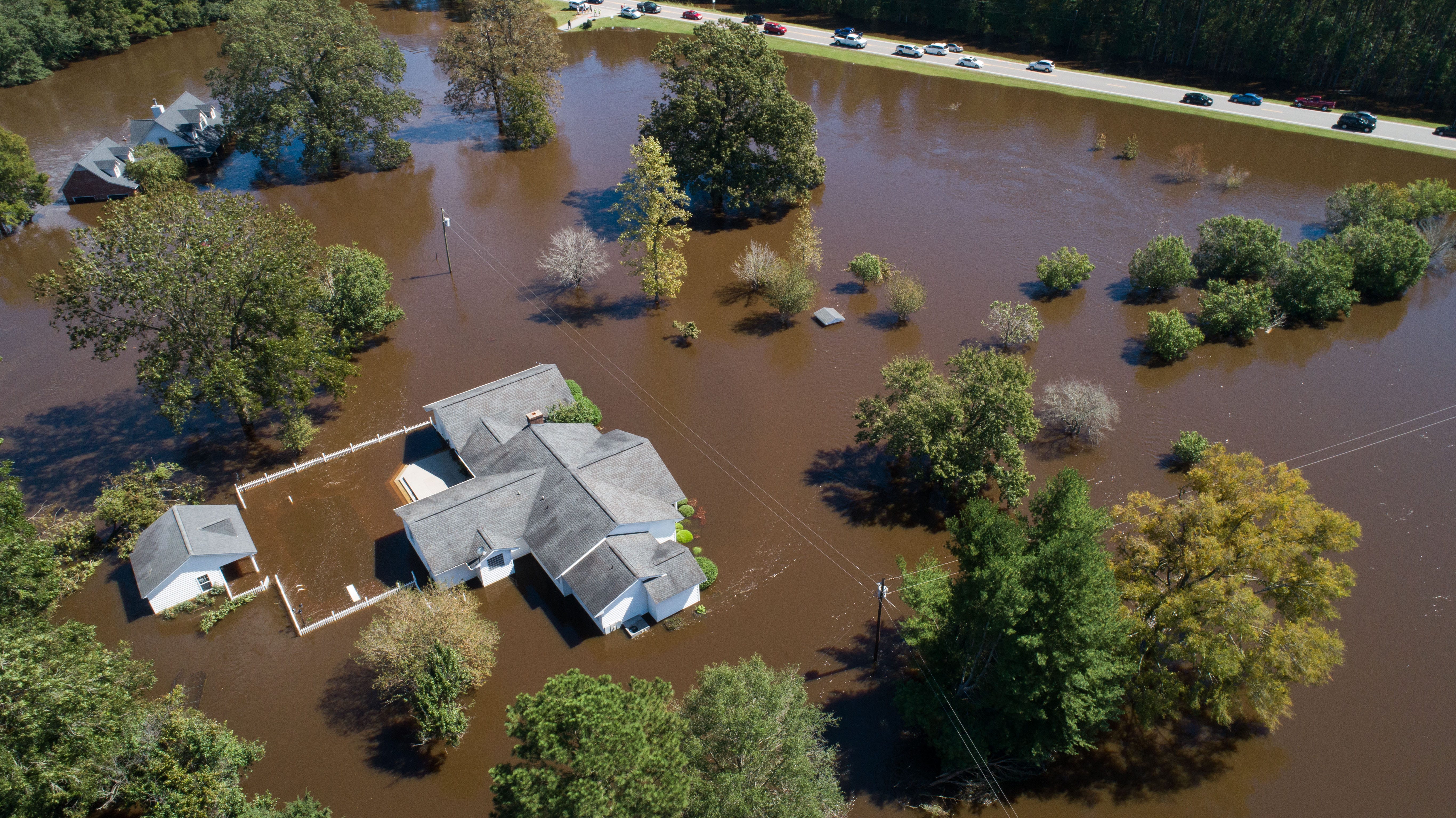 Homes on the Wood family's property are seen severely flooded Tuesday, Sept. 18, 2018, in the aftermath of Florence in Linden, N.C. Dale Wood, who has lived on the property about 47 years, and his wife, Angie Wood, said their home was also flooded by