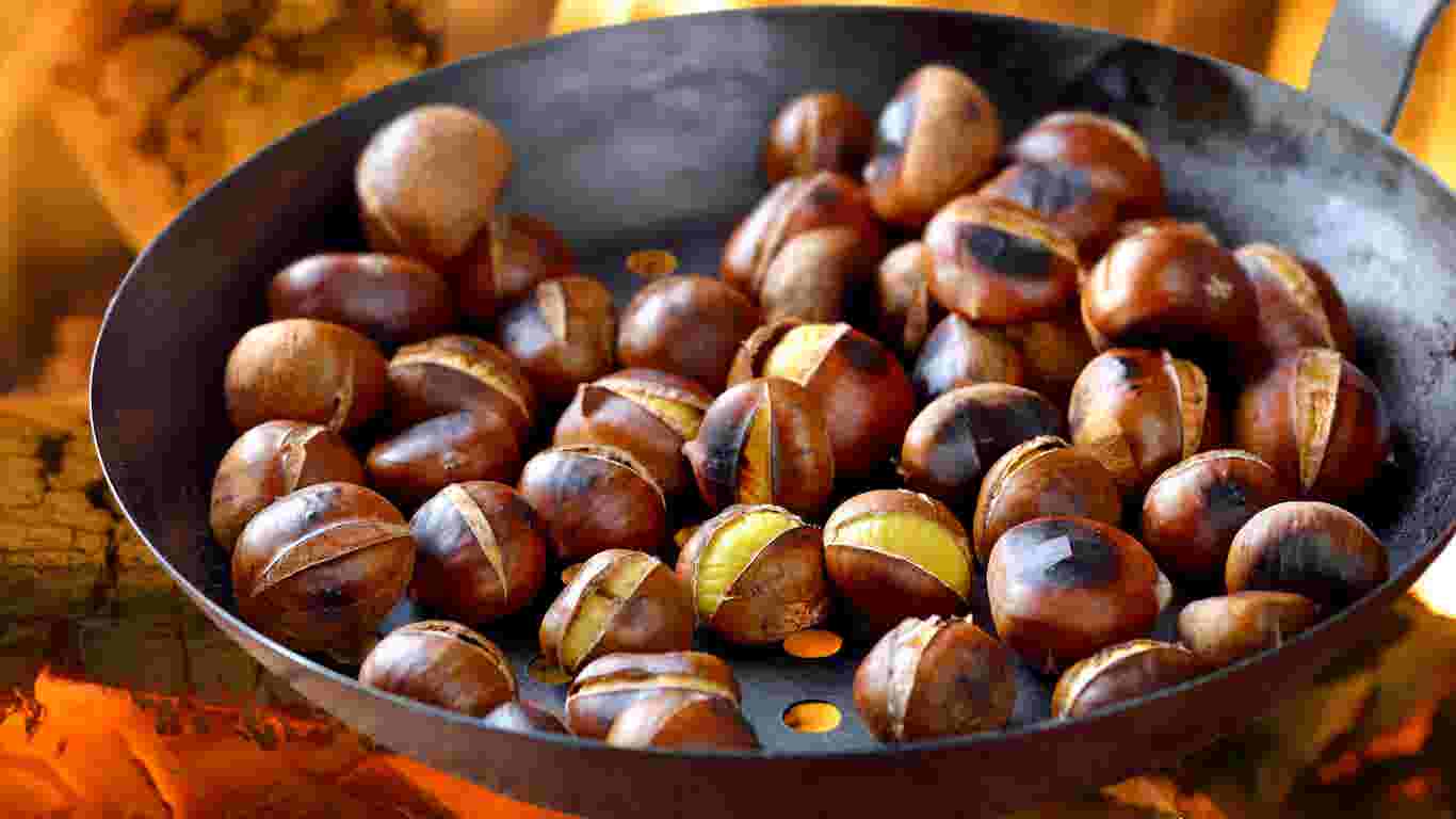 Chestnuts roasting on an open air fryer