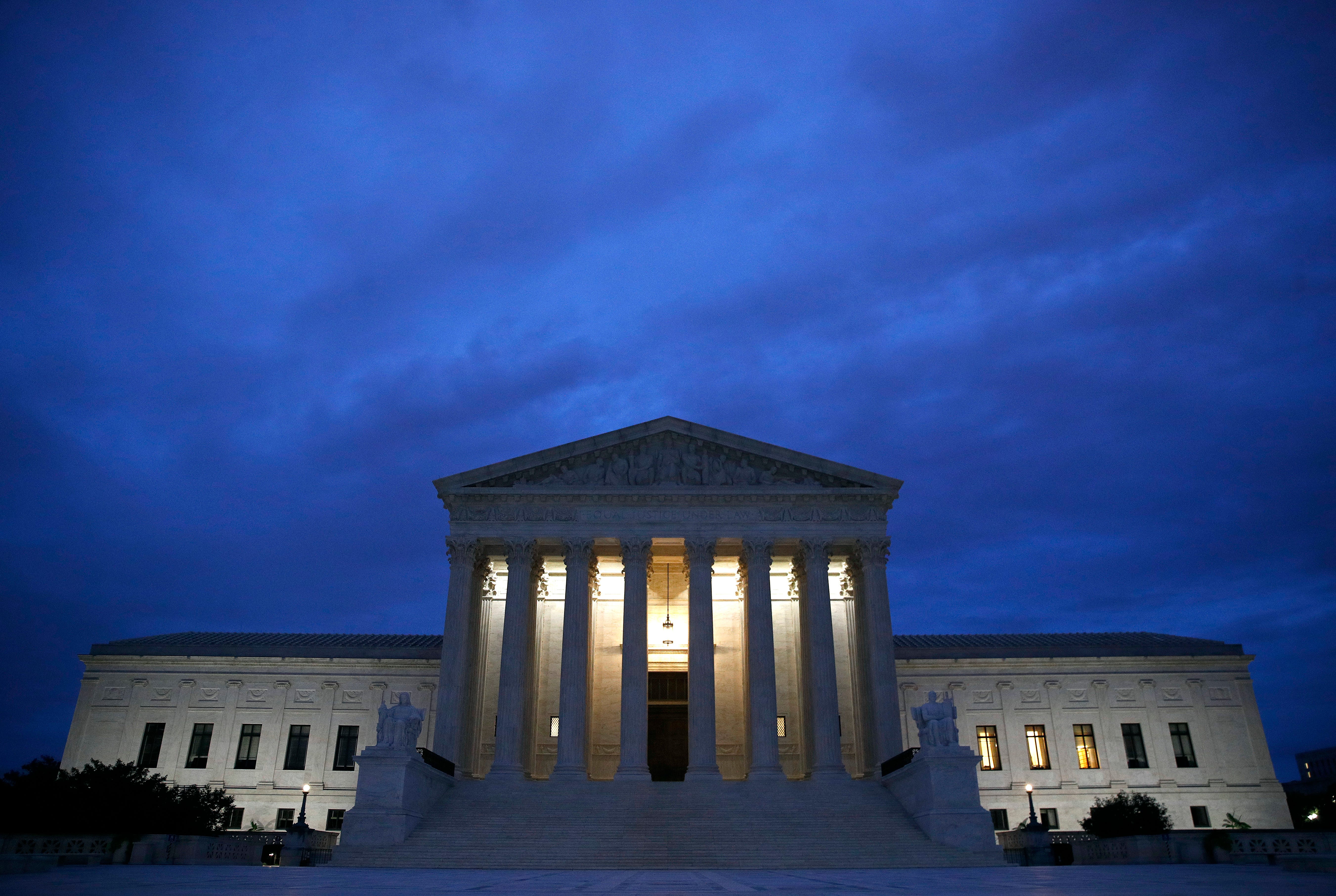 The Supreme Court building is seen at dawn on Capitol Hill in Washington, Sept. 27, 2018. The Senate Judiciary Committee is scheduled to hear from Supreme Court nominee Brett Kavanaugh and Christine Blasey Ford, the woman who says he sexually assault