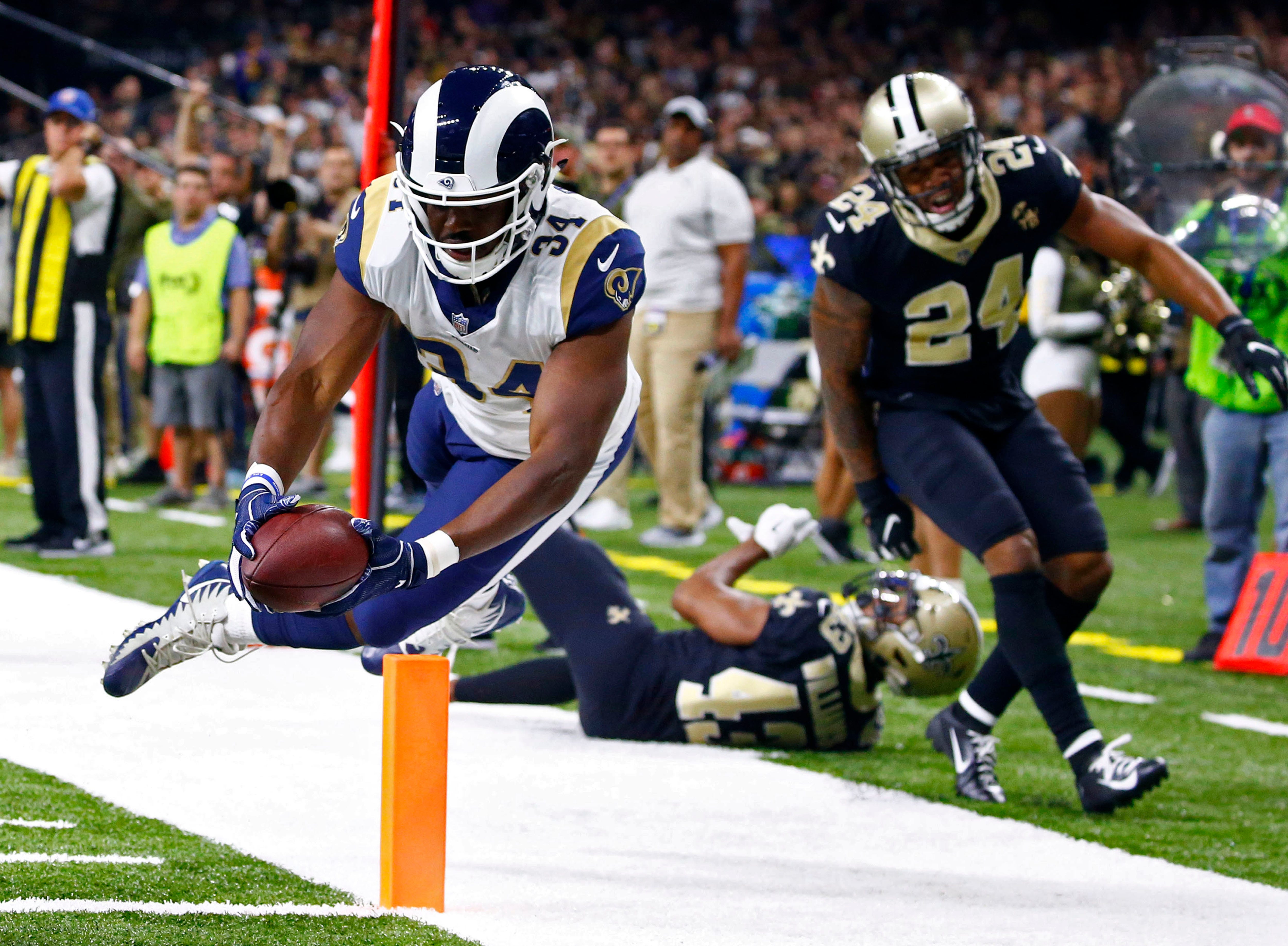 The Latest: Brown scores spectacular TD to help Rams rally