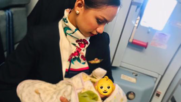 Flight attendant nurses passenger's baby