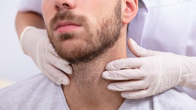 You may have an enlarged thyroid and it will look like a lump at the base of your neck. Goiters are sometimes treated with iodine supplementation prior to surgically removing the thyroid gland.