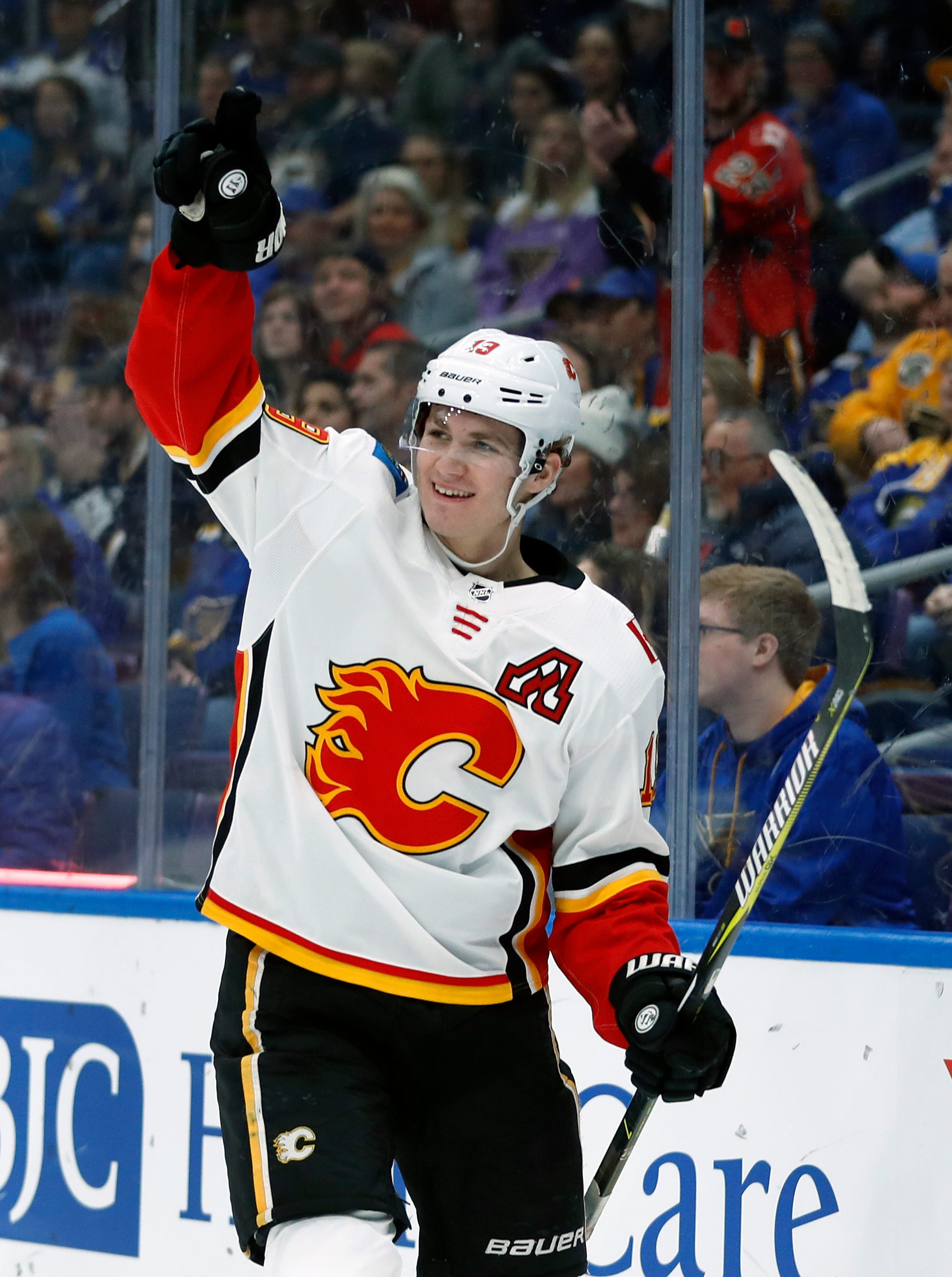 Tkachuk gets 1st goal in hometown, leads Flames over Blues