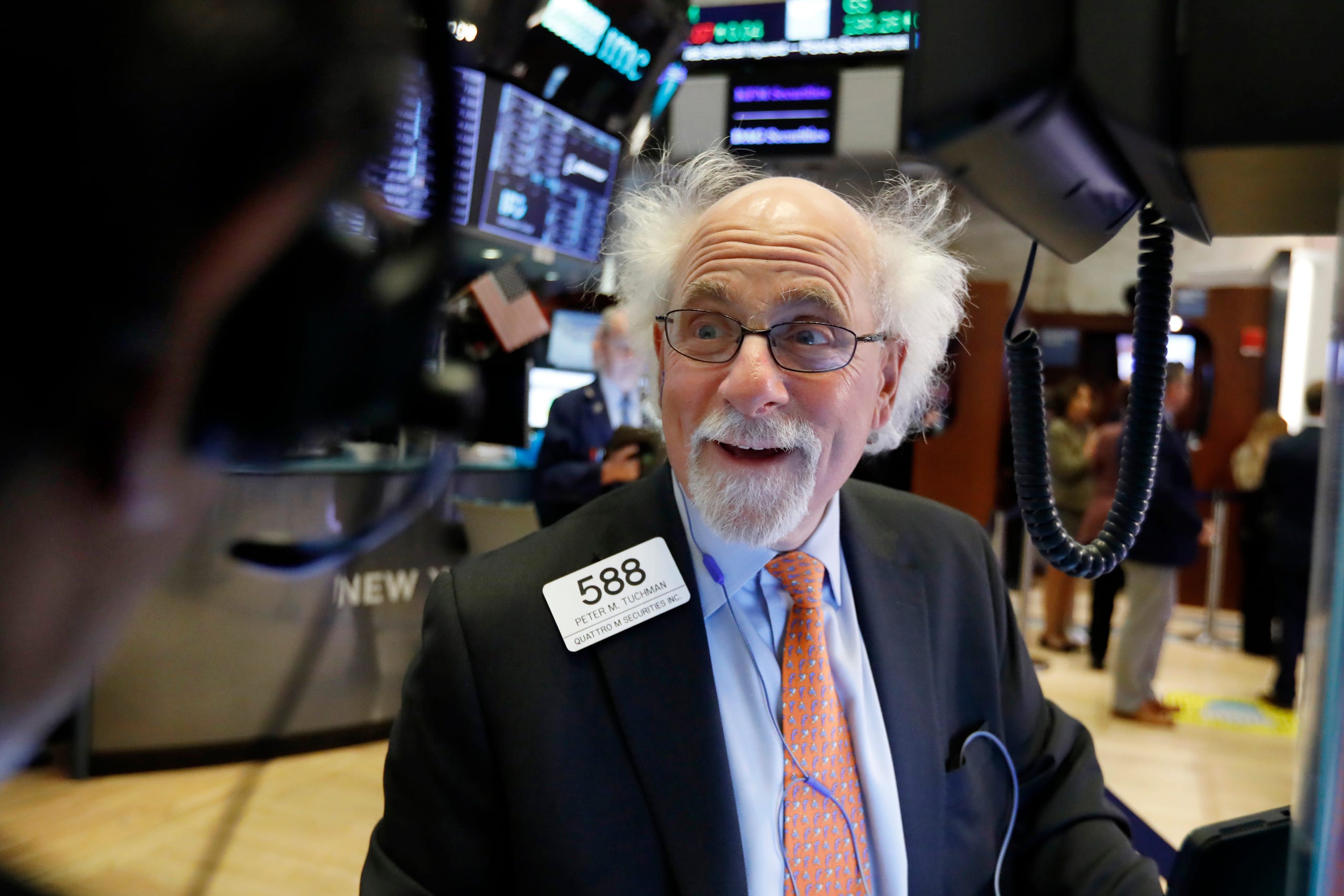 Trader Peter Tuchman works on the floor of the New York Stock Exchange, Monday, March 18, 2019.
