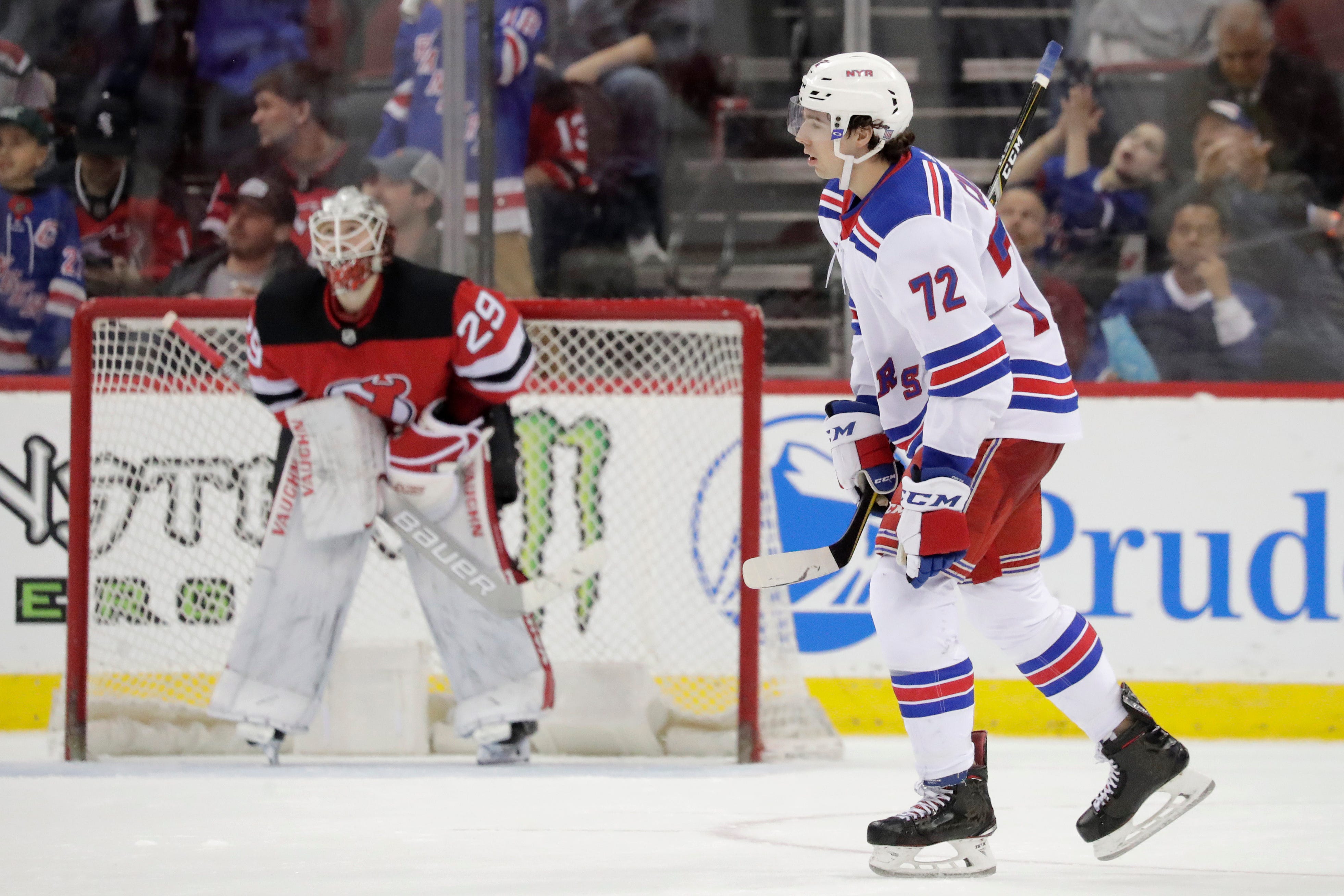 Carrick scores late as Devils beat Rangers, avoid sweep