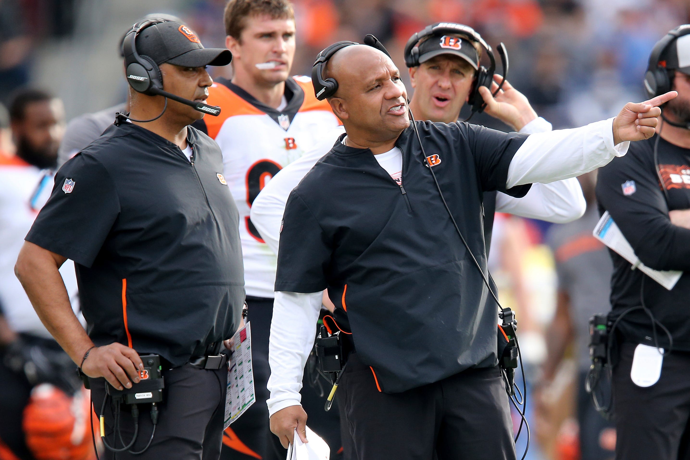 Former Cincinnati Bengals head coach Marvin Lewis, left, was the NFL's seventh Black coach. His staff, including special assistant to the head coach Hue Jackson, right, continued the team's history of championing diversity. But in the past three years, the Bengals' coaching diversity has plummeted to worst in the league.