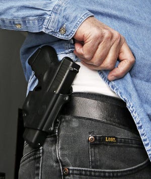 According to Florida law, to be considered concealed weapons must be hidden from 'the ordinary sight of another person.'