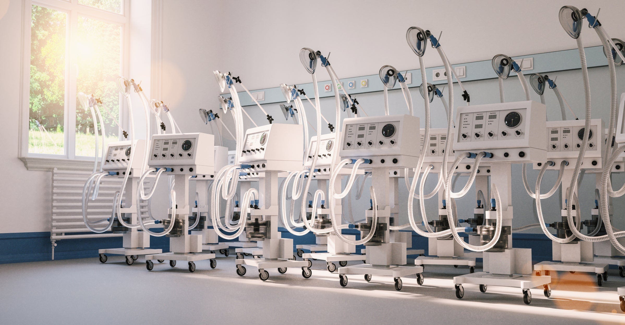 Many ventilators and respirators lined up for use.