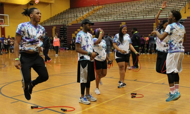 VSU dance organization Abstrakt Entertainment (AE) members practice dance moves during Donamatrix Day at Petersburg High School in 2019.