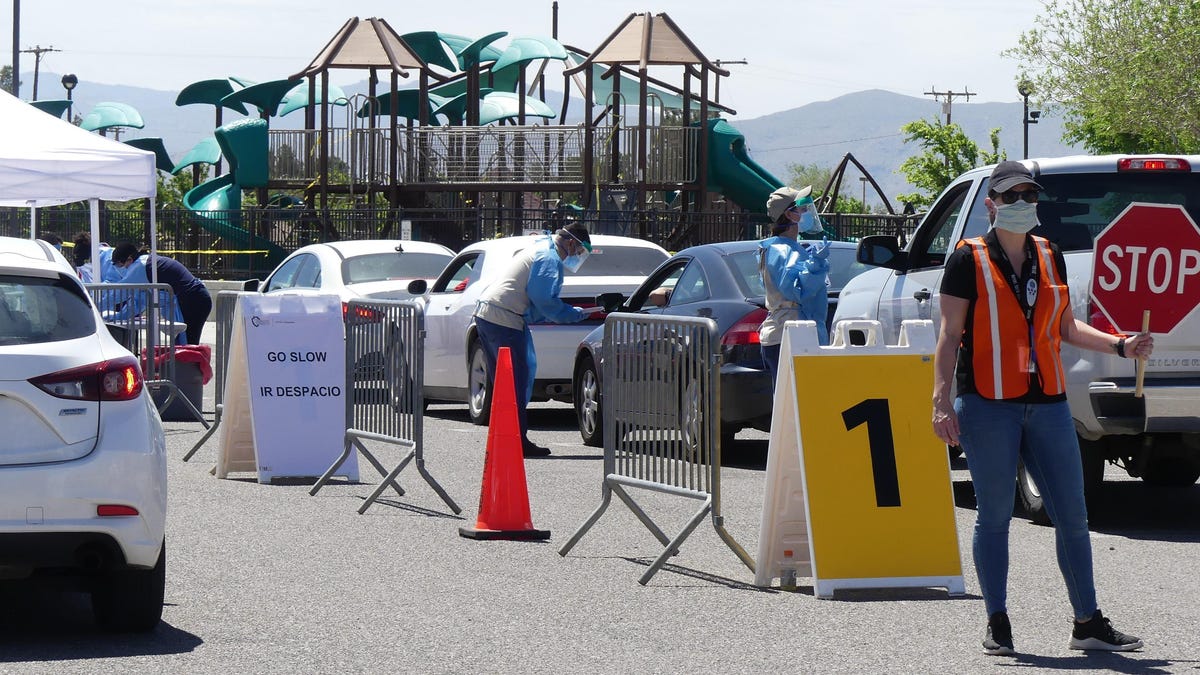 Hundreds of San Bernardino County residents waited in vehicles to be tested for COVID-19 on April 30, 2020, at Civic Center Park in Apple Valley.