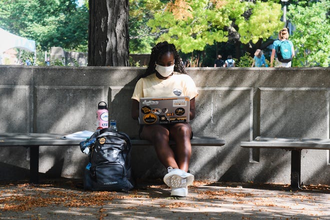 Brooke Douglass, an MU student, studies near the MU Student Center on Aug. 24.
