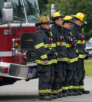 Worcester firefighters lined up for a moment of silence during the Sept. 11 ceremony in 2019.