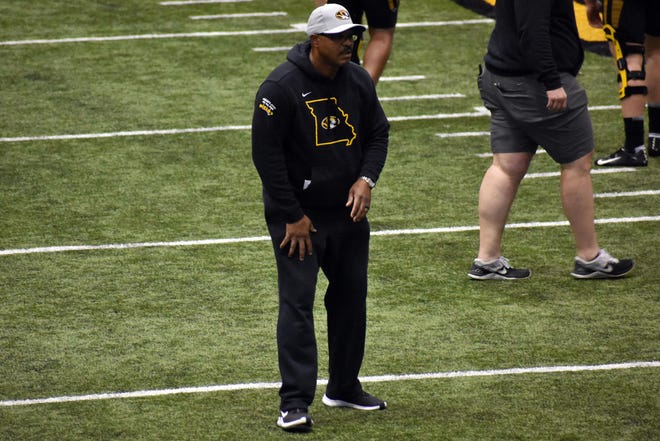 Missouri defensive backs coach Charlie Harbison watches a play during a March practice at the Devine Indoor Facility.