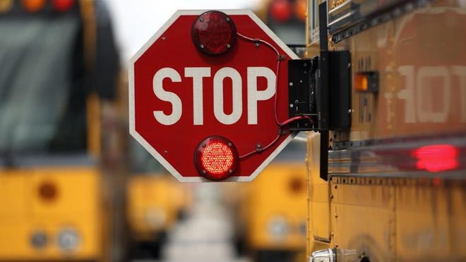 A New Hampshire woman says her fifth-grade son was kicked off a school bus for the rest of the year because of a mask-wearing infraction.