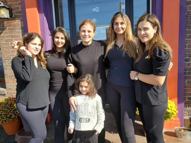 The Fakhoury family, daughters and widow of the late Amer Fakhoury, are seen in October 2020, when they were preparing to reopen Little Lebanon To Go restaurant in Dover. From left are Amanda, Macy, Micheline, Zoya and Guila with 4-year-old Kira in front.