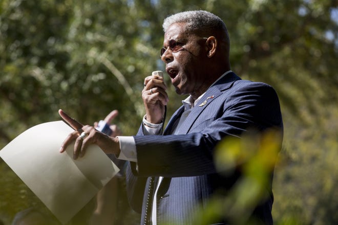 Texas GOP Chairman Allen West speaks at outside Governor's Mansion in October during protest of Gov. Greg Abbott's handling of the coronavirus pandemic.
