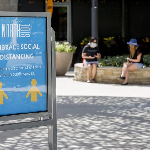 A sign encouraged social distancing at Domain Nort