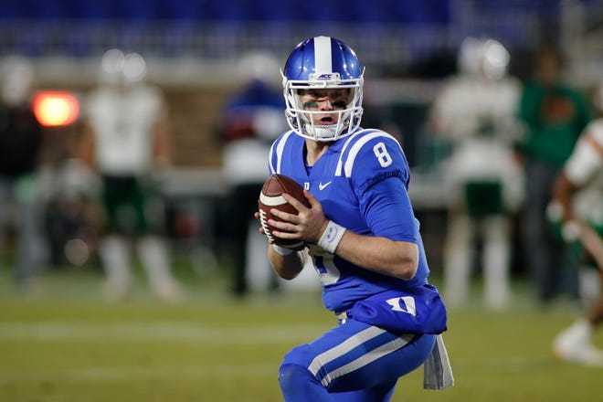 Duke quarterback Chase Brice (8) runs the offense against Miami during the second half of an NCAA college football game Saturday, Dec. 5, 2020, in Durham, N.C. (Nell Redmond/Pool Photo via AP)