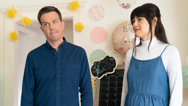 Ed Helms, left, and Patti Harrison in a scene from “Together Together.”