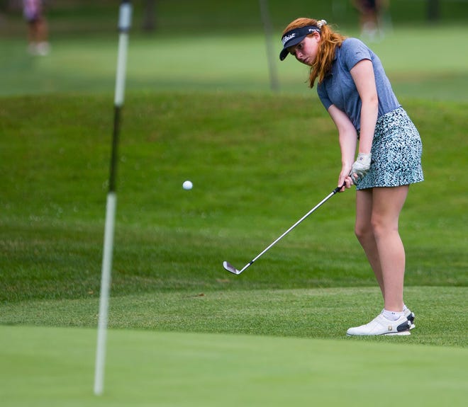 Delaney Wade chips onto a green during the women's metro golf tournament Thursday, July 8, 2020 at Erskine Golf Club in South Bend.