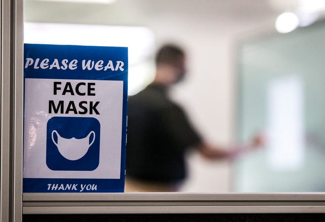 A sign asks students to wear masks at Purdue Polytechnic High School in South Bend. The St. Joseph County Health Department is strongly encouraging school districts to adopt CDC guidance for indoor mask wearing ahead of the start of the 2021-22 school year.