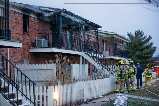 Firefighters work at the scene of a fire Thursday, Jan. 30, 2020 at the Remington Court Apartments in Mishawaka.