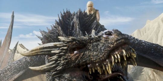 Emilia Clarke rides atop a dragon in "Game of Thrones." Season seven is now on Blu-ray and DVD. HBO (courtesy)