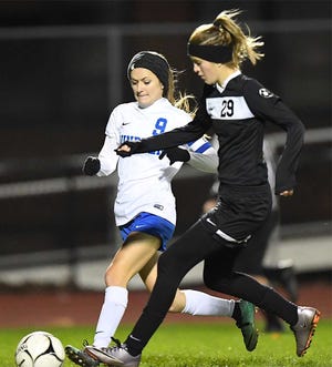 Madison Leitenberger (9), shown in this photo from earlier in the season, scored Windber’s first goal against Bishop McCort in the first round of the PIAA Class A girls soccer playoffs Tuesday in Somerset.