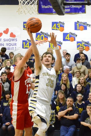 Turkeyfoot’s Chandler Enos scored his 1,000th career point on this shot against Fannett-Metal in the first round of the District 5 Class A playoffs Tuesday night.