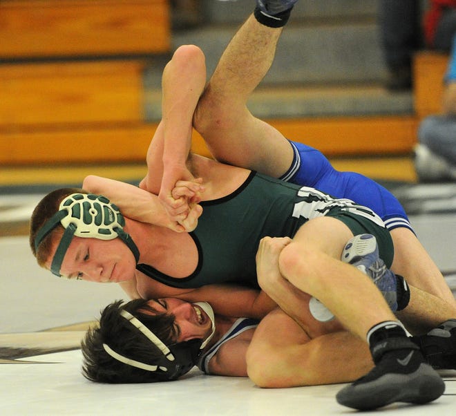 North Star’s Jacob Blough turns over Bedford’s Noah Baughman to win by pinfall at 106 pounds Thursday night in Boswell.