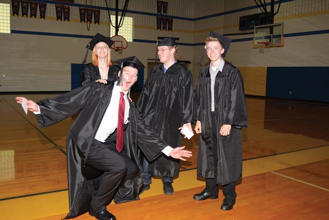 Photo by Loretta A. ColemanThe Allegany College of Maryland Somerset Campus held graduation ceremonies Tuesday. Pictured in the front row is Elliott Costlow. In the back row are Kelli Berkley, Matthew Miller and Brady Schmidt Twenty-four students from a class of 28 participated in the ceremony, which was held at Shanksville-Stonycreek High School.