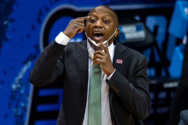 Cleveland State head coach Dennis Gates directs his team during a first-round game against Houston in the NCAA Tournament on March 19, 2021, at Assembly Hall in Bloomington, Ind.