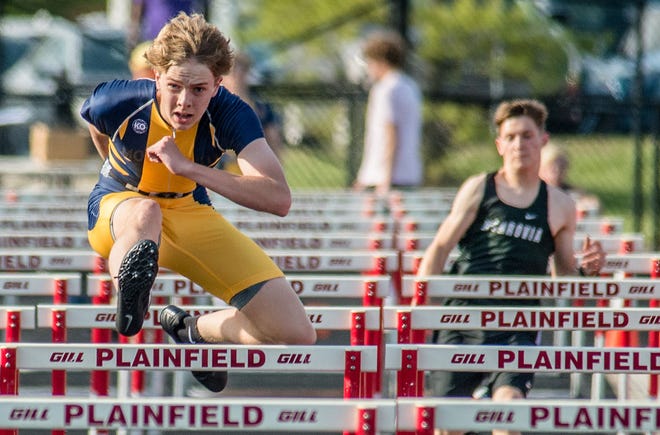 Mooresville sophomore Casey Rustman clears a hurdle ahead of Monrovia freshman Hunter Burnham during the second preliminary heat of the 110-meter hurdle competition at the Plainfield sectional on Thursday, May 20, 2021. (Eric Scott Miller / Correspondent)