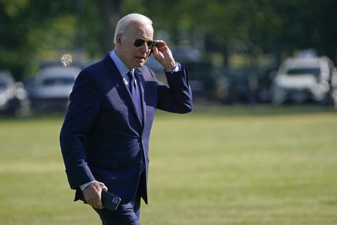 President Joe Biden walks off of Marine One on the Ellipse near the White House, Thursday, May 27, 2021, after returning from a trip to Cleveland. (AP Photo/Susan Walsh)