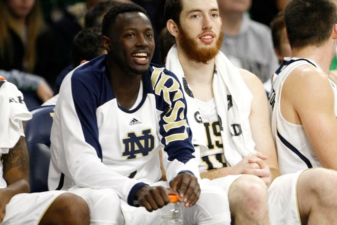 Notre Dame guard Jerian Grant smiles on the bench during a blow-out win against Cornell during a men's NCAA college basketball game on Sunday, Dec. 1, 2013, at the Purcell Pavilion at Notre Dame. SBT Photo/JAMES BROSHER