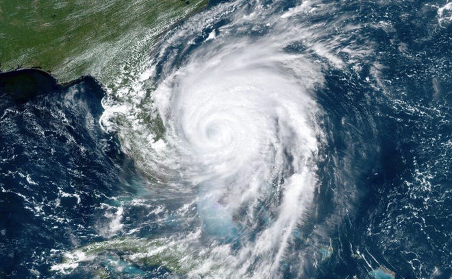 This satellite image taken Sept. 3, 2019, and provided by National Oceanic and Atmospheric Administration, shows Hurricane Dorian moving off the east coast of Florida in the Atlantic Ocean.