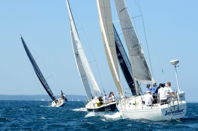 Sailors compete in a previous year's Ugotta Regatta on Little Traverse Bay.