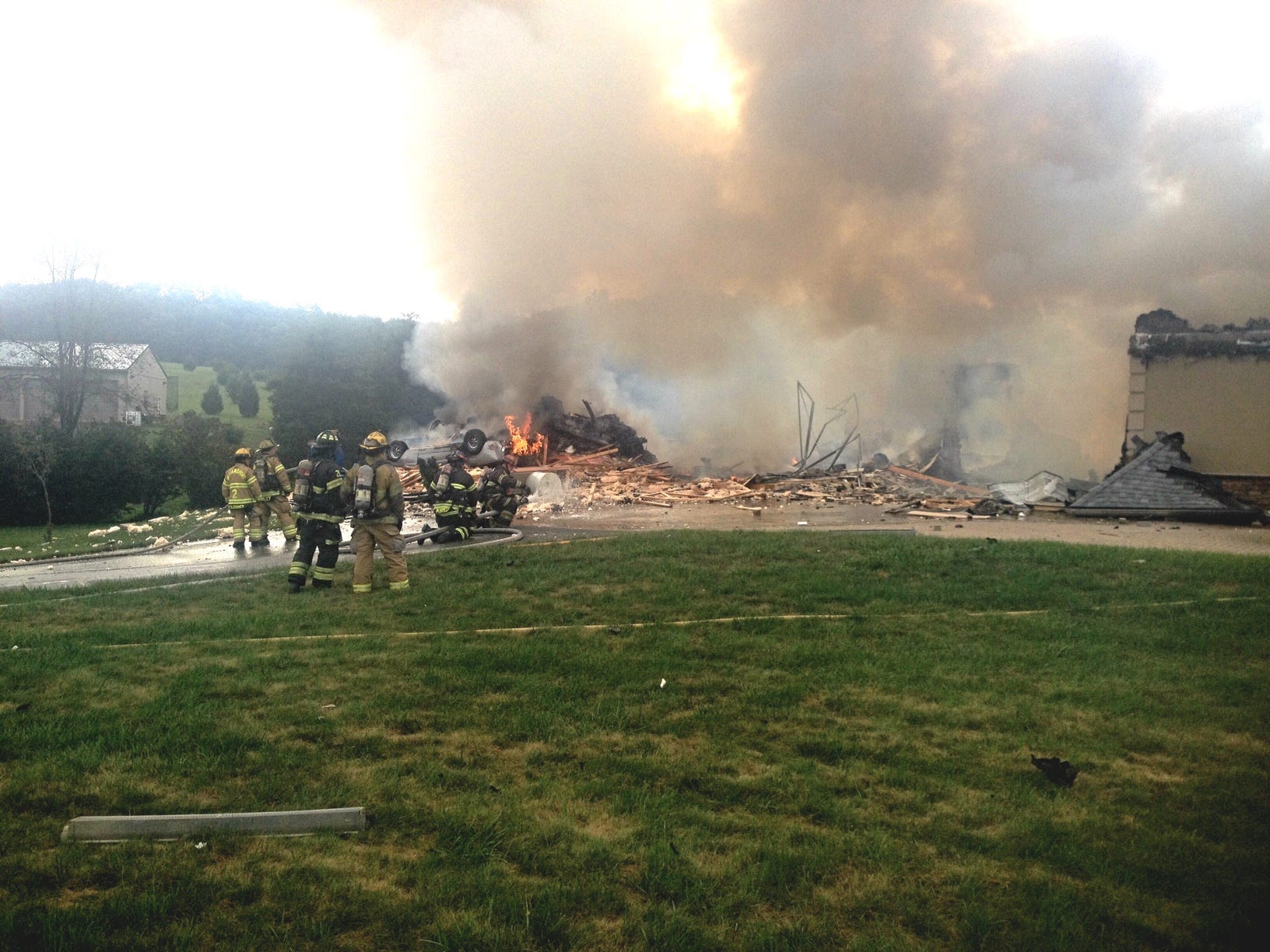 Fire, reported explosion destroy home near Hancock