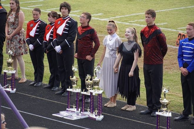 Owen Valley Band &amp; Guard received several awards at the competition Saturday. Shown are Andrew Heaton, Sydney Jemison, Hannah Amos and Travis Floyd. (Susan Wrightsman / Spencer Evening World)