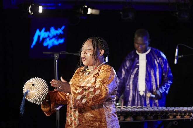 Vocalist Hawa Kasse Mady Diabate, left, performs with Trio Da Kali in this file photo. Lassana Diabate plays a balafon in the background. Courtesy photo
