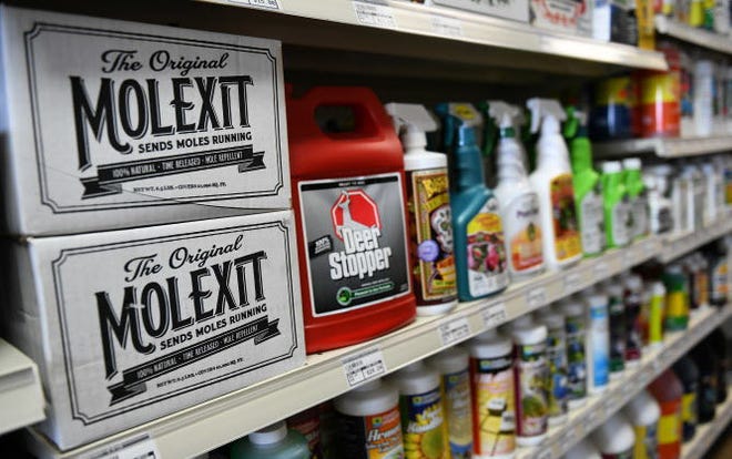 Pesticides and a wide range of fertilizers are available at B-Town Botanicals. Chris Howell | Herald-Times