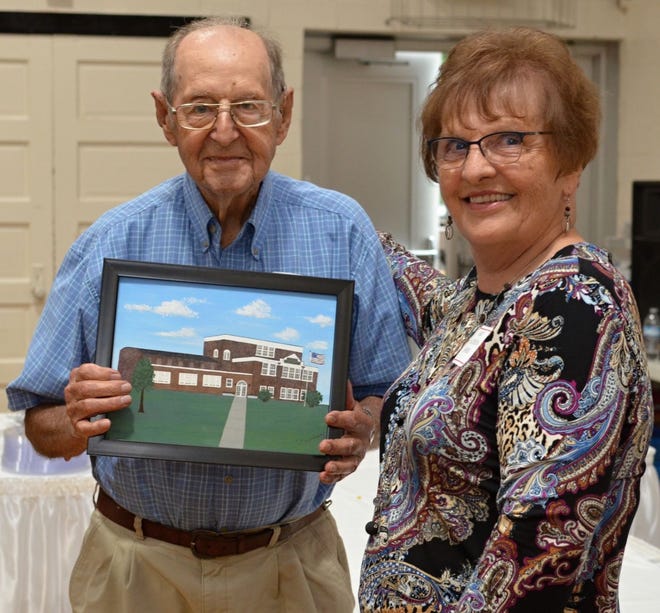 The Patricksburg Alumni Banquet / High School reunion was recently held with 203 people in attendance. The winners of the oldest graduate and who traveled the farthest awards received a drawing of the school building in the original condition it was when they were students there. The oldest living graduate is John Schafer, age 97, who graduated in 1940.