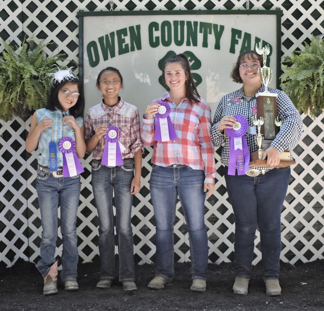 2019 Owen County Fair Round Robin Showmanship winners are, from left: Meilynn Hess (junior), MiaRose Hess (intermediate), Haley Amick (senior) and Mahailee Kemp (advanced). (Amanda York / Spencer Evening World)
