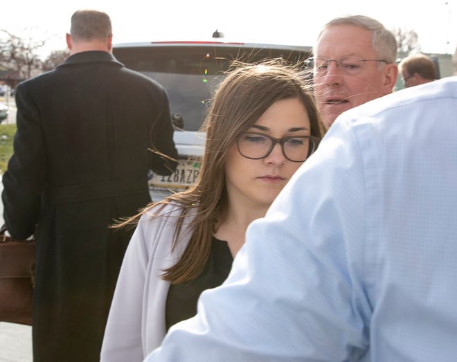 Alyssa Shepherd is escorted into the Fulton County Courthouse in Rochester. Tribune File Photo