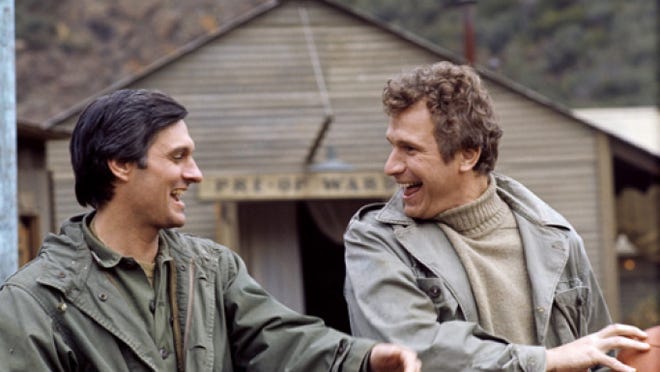 Alan Alda and Wayne Rogers in an early episode of CBS hit "M*A*S*H," which premiered Sept. 17, 1972.