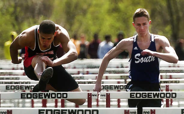 Edgewood’s Damien Chambers (left) and Bloomington South’s Eli Stidd race to a 1-2 finish in the 110-meter high hurdles in Saturday’s Edgewood Invitational at Ellettsville.David Snodgress | Herald-Times