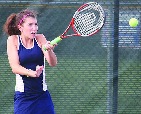 Sophomore Rachel Wathen of Mooresville returns a ball during MondayÕs Mid-State Conference match at Martinsville. Wathen and her doubles partner, sophomore Michelle Majeski, won their match, 6-3, 6-2. Photo by Melissa Dillon.