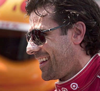 Dario Franchitti smiles after gaining pole position during qualifying sessions for today’s Honda Indy Toronto race.Chris Young | Associated Press