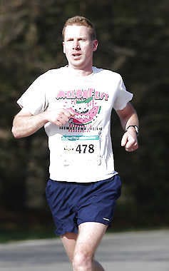 Jeremy Hogan | Herald-Times Justin Graham won the H-T/YMCA spring 10-kilometer race Saturday by almost a minute, finishing in 37.56.7.