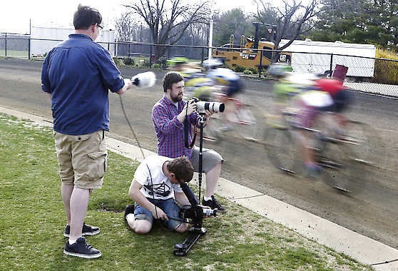 Left to right, Peter Stevenson, Ryan Black and Tom Miller work as a team while making a documentary titled “One Day in April” about this year’s Little 500 race.